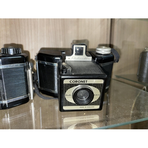 548 - THREE CORONET BAKELITE CAMERAS MODEL 66, CADET AND FLASH MASTER CIRCA 1950S