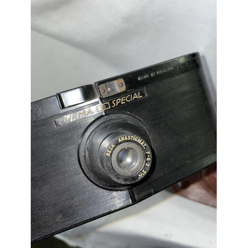 551 - PURMA SPECIAL UNIQUE BAKELITE AND TIN CAMERA WITH GRAVITY CONTROLL SHUTTER SPEEDS 1930S