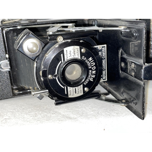 560 - TWO FOLDING BELLOWS ROLL FILM CAMERAS ENSIGN SELFIX MODEL 20 AND KERSHAW EIGHT - 20 PENGUIN