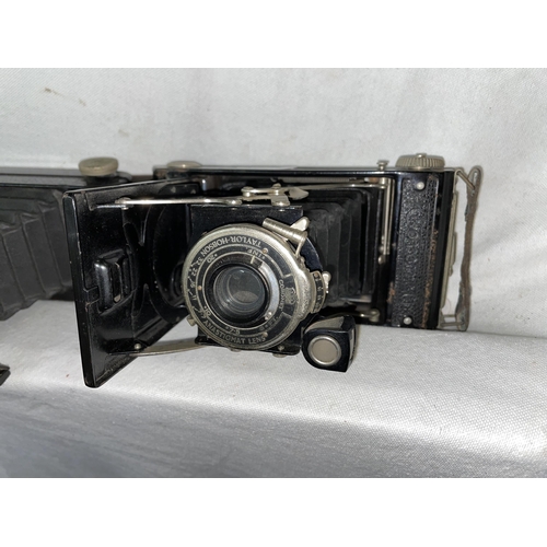 560A - TWO CORONET FOLDING BELLOWS CAMERAS CIRCA 1926 - 50S