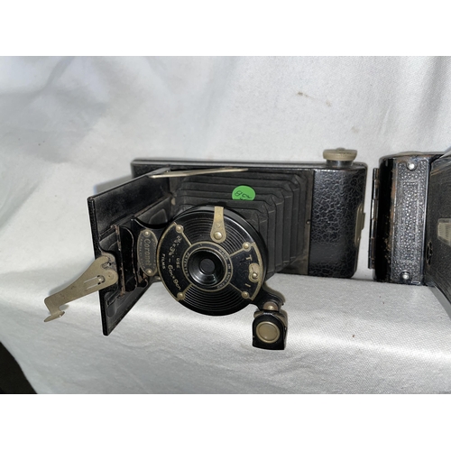 560A - TWO CORONET FOLDING BELLOWS CAMERAS CIRCA 1926 - 50S