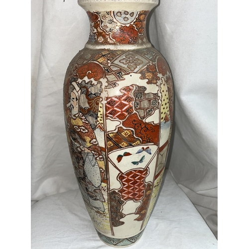 610 - SATSUMA EARTHENWARE BALUSTER VASE DECORATED WITH PANELS OF FIGURES MINOR CHIP TO RIM