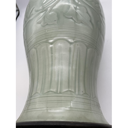 612 - CHINESE CELADON GREEN BALUSTER VASE TABLE LAMP ON HARDWOOD STAND WITH MOULDED DECORATION TO GLAZE 57... 