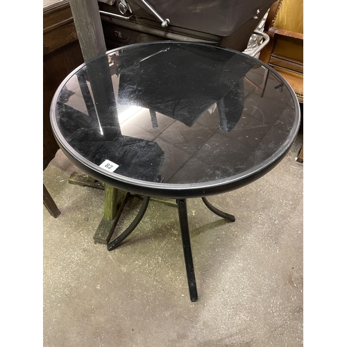 82 - BLACK TUBULAR CIRCULAR PATIO TABLE