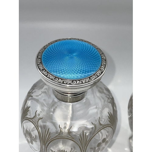 508 - PAIR OF SILVER AND BLUE ENAMEL TOPPED BALUSTER SCENT BOTTLES STOPPER A/F ON ONE BOTTLE