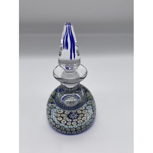 509 - MULTI CANE MILLEFIORE INKWELL AND STOPPER, AND A SILVER REPOUSE COVERED SQUARE SECTION BOTTLE (BOTTL... 