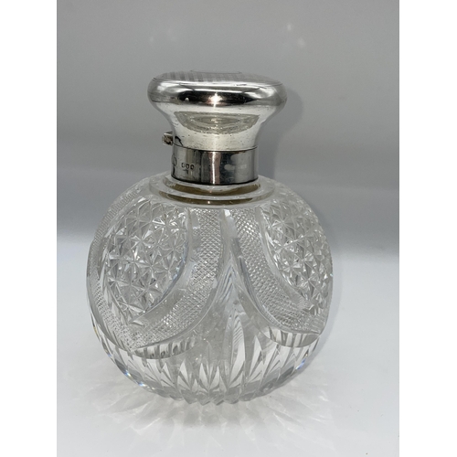 511 - SILVER TOPPED GLOBULAR BLAZE CUT AND HOB NAIL SCENT BOTTLE