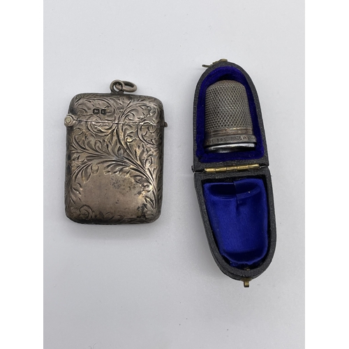 532 - CASED STERLING SILVER THIMBLE AND A SILVER ENGRAVED VESTA CASE