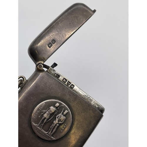 533 - CHESTER SILVER ENGRAVED VESTA CASE WITH APPLIED MEDALLION 1300 - 1500