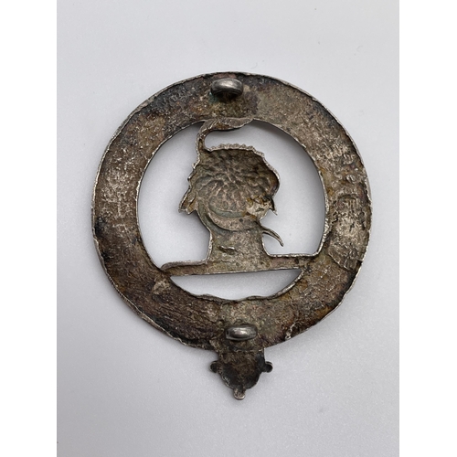 598 - BASE METAL BENE FACTUM BROOCH (PIN MISSING)