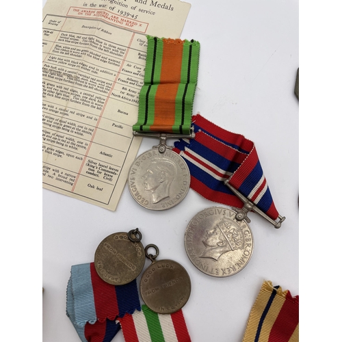 571D - BOX OF WWII WAR MEDALS INC. DEFENCE AND SERVICE MEDALS, AFRICA STAR, ITALY STAR AND 1939-1945 STAR W... 