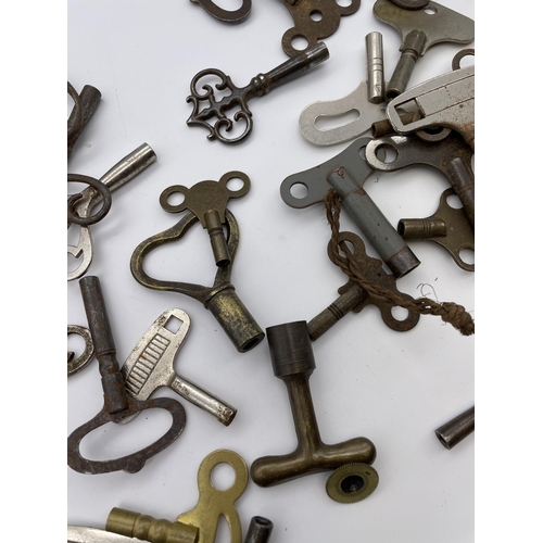 577 - THREE BAGS OF VARIOUS WATCH AND CLOCK KEYS