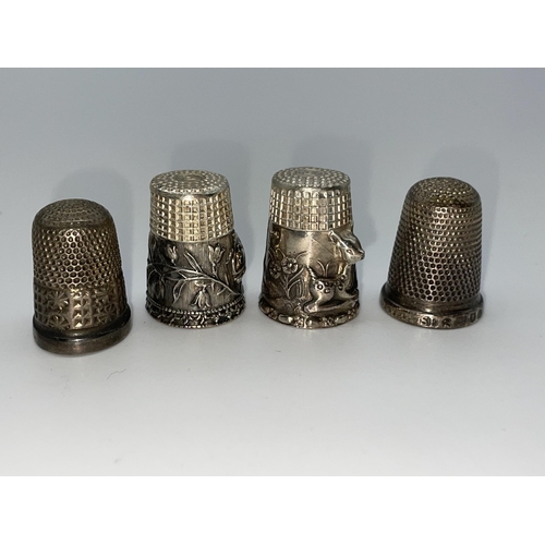 578 - FOUR SILVER THIMBLES