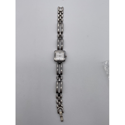 595 - LADIES SQUARE FACED WRIST WATCH ON SILVER OPEN LINK STRAP