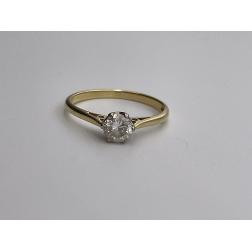 557 - STAMPED 750 18CT YELLOW GOLD AND DIAMOND SOLITAIRE RING SIZE N 2.3G APPROX