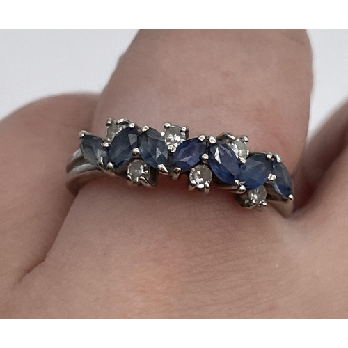 558 - 18K WHITE GOLD SEVEN STONE SAPPHIRE AND DIAMOND RING SIZE M 3.9G APPROX