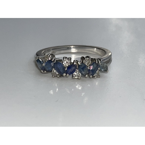 558 - 18K WHITE GOLD SEVEN STONE SAPPHIRE AND DIAMOND RING SIZE M 3.9G APPROX