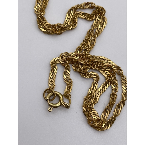 560 - STAMPED 750 YELLOW GOLD FLAT CURB TWIST CHAIN 5.2G APPROX