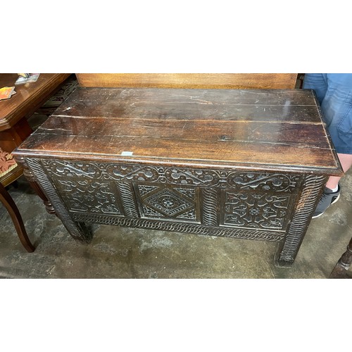 131 - 18TH CENTURY CARVED THREE PANEL COFFER