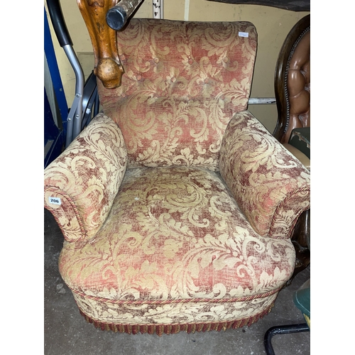 105 - RED AND GOLD FLORAL PIPE EDGED VICTORIAN ARMCHAIR