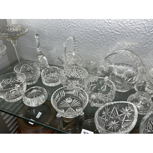 284 - TWO SHELVES OF QUALITY CUT GLASSWARES INCLUDING BISCUIT BARREL, ICE PAIL, LEMONADE JUGS, BASKETS, BO... 