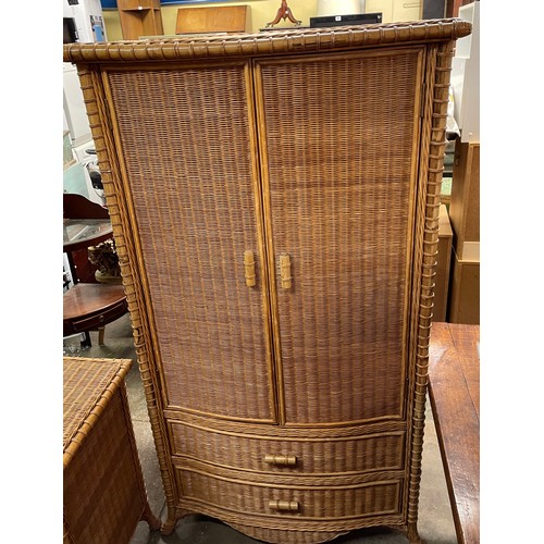 209 - BAMBOO RATTAN SERPENTINE WARDROBE WITH TWO BASE DRAWERS