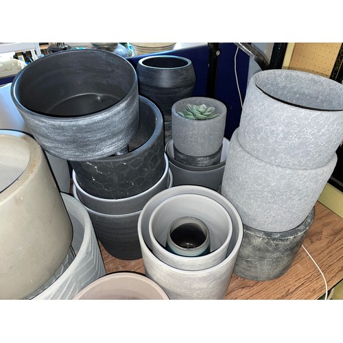 157 - COMPLETE TABLETOP OF CHARCOAL AND SLATE GREY MAINLY CIRCULAR AND HEXAGONAL PLANT POTS