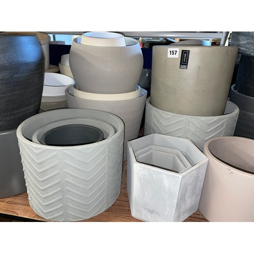 157 - COMPLETE TABLETOP OF CHARCOAL AND SLATE GREY MAINLY CIRCULAR AND HEXAGONAL PLANT POTS