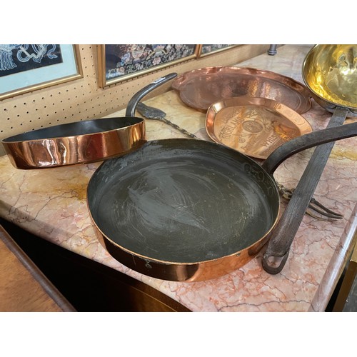 251 - TWO COPPER SKILLET PANS, LARGE BRASS LADLE, TEACHERS WHISKY ADVERTISING TRAY