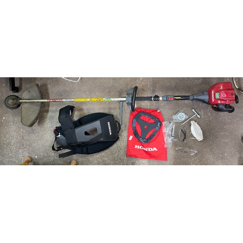 223 - HONDA PETROL STRIMMER AND NYLON HARNESS