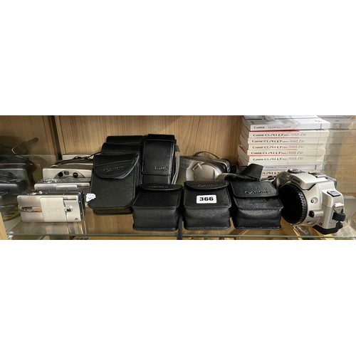 366 - SHELF OF CANON EOS AND IXUS CAMERAS