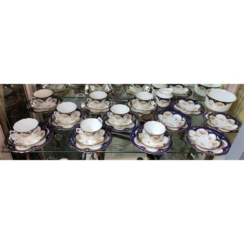 443 - VICTORIAN ROYAL BLUE GILDED FLORAL TEASET - 8 CUPS AND SAUCERS