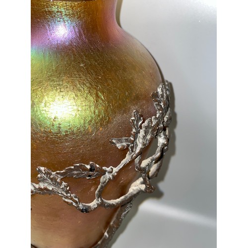 441 - IRIDESCENT AMPHORA STYLE GLASS VASE IN VERDI GRIS METALWORK FOLIATE STAND