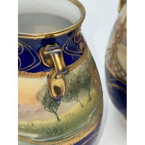 514 - PAIR OF NORITAKE ROYAL BLUE AND GILT  TWIN HANDLED BALUSTER MINIATURE VASES