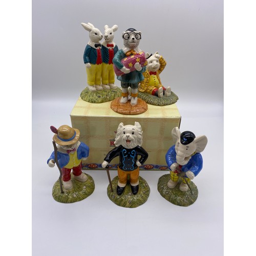 261 - BOXED ROYAL DOULTON THE RUPERT COLLECTION FIGURES INCLUDING PODGY LANDS WITH A BUMP, PING PONG LEADI... 