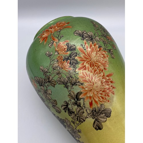 433 - JAPANESE BALUSTER VASE DECORATED WITH CHRYSANTHEMUMS ON A GREEN TONE GROUND WITH SCRIPT 30CM H