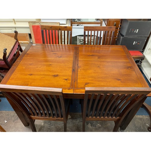 1 - CONTEMPORARY DARK WOOD EXTENDING DINING TABLE WITH FOUR MATCHING CHAIRS