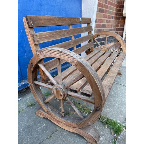 226 - WOODEN GARDEN BENCH WITH CARTWHEEL ENDS