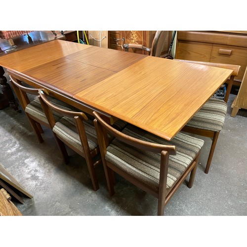 186 - VINTAGE 1960S WHITE & NEWTON TEAK EXTENDING DINING TABLE AND SIX MOQUETTE COVERED CHAIRS