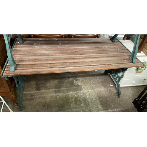 142 - CAST IRON BASE GARDEN TABLE WITH SLATTED TOP