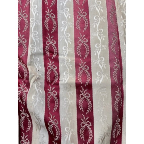 101 - TWO PAIRS OF RED AND CREAM STRIPED CURTAINS DECORATED WITH WREATHS AND RIBBON