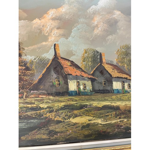 145 - 20TH CENTURY GILT FRAMED OIL ON CANVAS OF COTTAGES IN MOUNTANOUS LANDSCAPE SIGNED MOLLIN