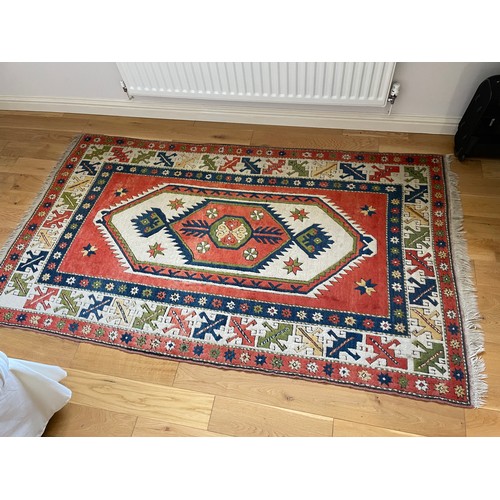 129 - ABSTRACT GEOMETRIC PATTERNED FRINGED CARPET AND ONE OTHER