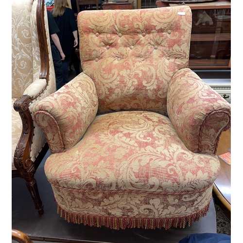 182 - RED AND GOLD FLORAL PIPE EDGED VICTORIAN ARMCHAIR