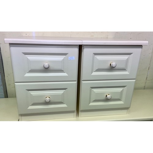 56 - PAIR OF CREAM TWO DRAWER BEDSIDE CABINETS