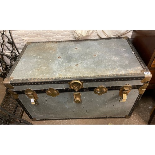 134 - LARGE BLUE TRAVELLING TRUNK