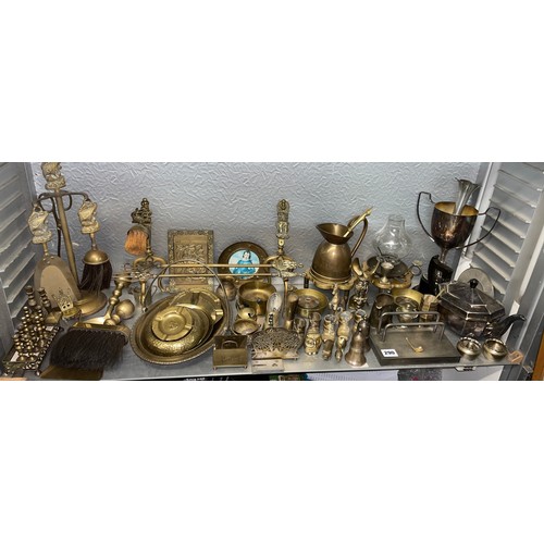 290 - LARGE SELECTION OF BRASS WARE INC. ASHTRAYS, TRENCHART SHELL CASES, GRADUATED CANDLESTICKS, BOOTS AN... 