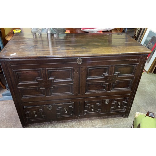 106 - 17TH CENTURY OAK MULE CHEST WITH GEOMETRIC MOULDED PANELLED FRONTS AND DRAWERS INITIALLED MD 115CM W... 