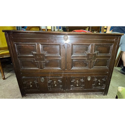 106 - 17TH CENTURY OAK MULE CHEST WITH GEOMETRIC MOULDED PANELLED FRONTS AND DRAWERS INITIALLED MD 115CM W... 