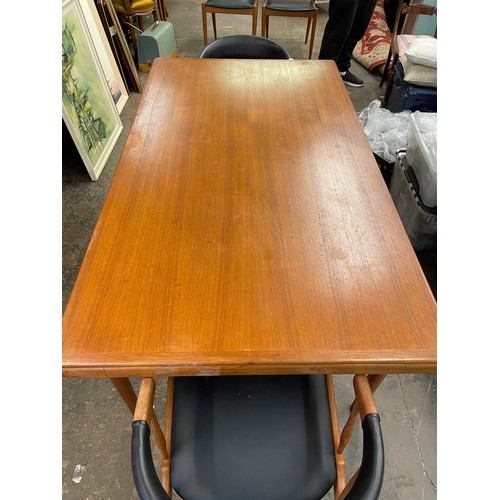 137 - 1960S DANISH TEAK EXTENDING DINING TABLE AND FOUR ARMCHAIRS DESIGNED BY JOHANNES ANDERSEN FOR BRDR. ... 